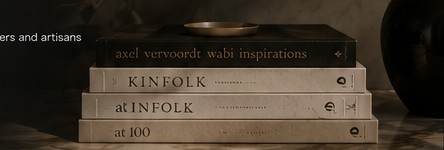 Curated books on a marble surface